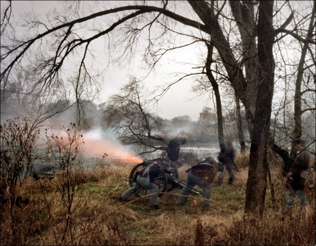 Union re-enactors fire cannons across the Rappahannock River into the City of Fredericksburg, during a reenactment of the Battle of Fredericksburg, VA. 2012