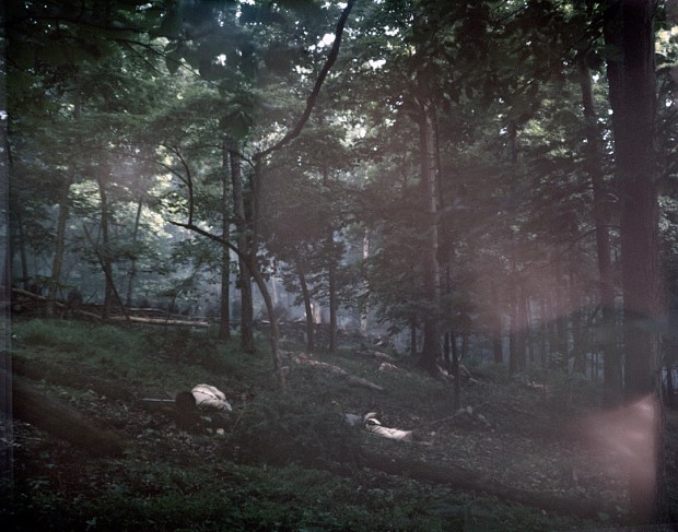 Confederate "dead" litter "Culps Hill" during a reenactment of the Battle of Gettysburg. 2013