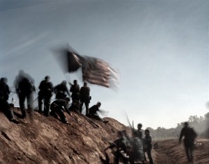 Reenactors storm an earthen fort in Henrico, Va